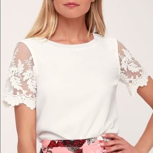 Lulu’s white Lisa Marie embroidered top